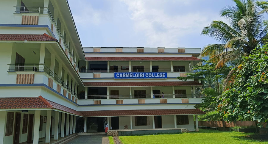 Students participating in a debate competition at Carmelgiri College